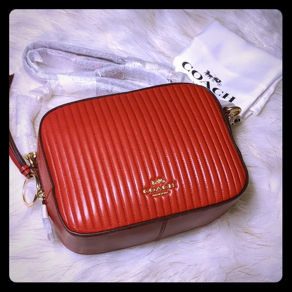 coach red quilted camera bag
